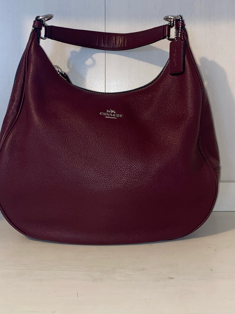 Coach Pebbled Leather Hobo Bag in Wine